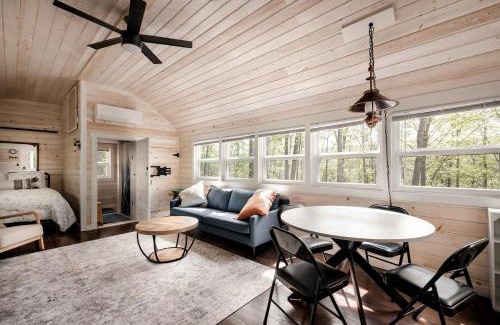 Great Cacapon House | Modern Tiny Cabin with Game Room & Fire Pit in West Virginia