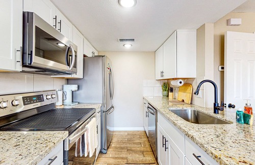 Fontana House | Modern townhome with pool, AC, W/D, grill, and private patio