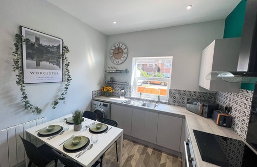 Worcester House | Modern two bed house with drive and EV parking.