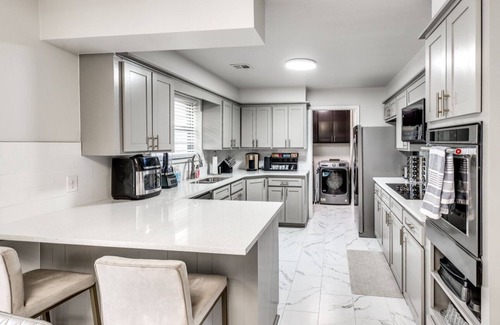 Oklahoma City House | Modern Urban Retreat With Hot Tub. Close to major popular restaurants. n
