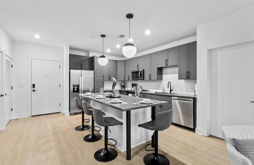Five Points South Apartment | Modern Vibes: 2-Bedroom Condo & Secure Parking