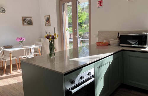 San Bovo Villa | Modern villa with private pool and panoramic vineyard views in Piemonte.