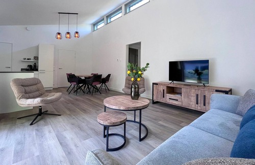 Dirkshorn House | Modern villa with terrace and garden in Dirkshorn
