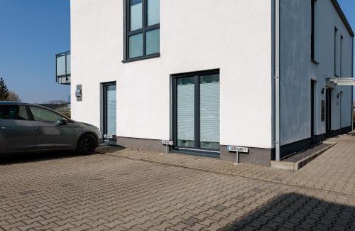 Ibbenbueren Apartment | Modernes Apartment mit Terrasse & Garten, Parkplatz & Self-Check-in
