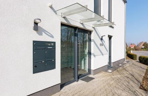 Ibbenbueren Apartment | Modernes Apartment mit Terrasse & Garten, Parkplatz & Self-Check-in