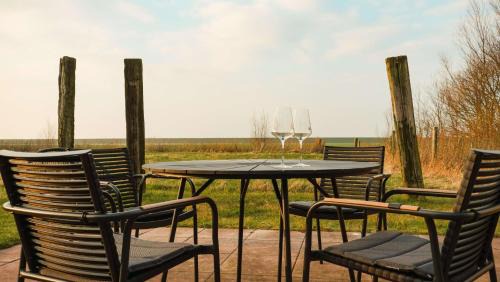 Tumlauer Koog Apartment | Modernes Holzhaus mit traumhaftem Deichblick