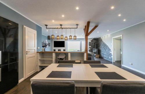 Tumlauer Koog Apartment | Modernes Holzhaus mit traumhaftem Deichblick