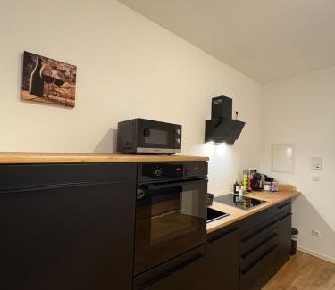 Ansbach Apartment | Modernes Serviced Apartment Wohnglück 2
