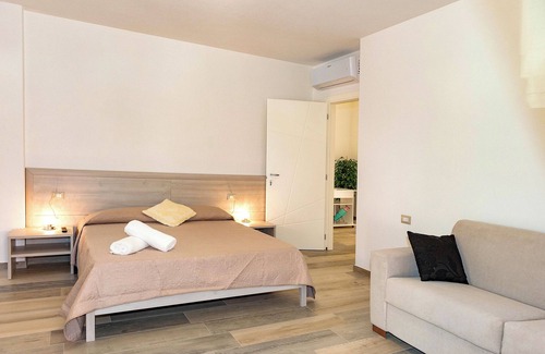 San Teodoro House | MOLAROTTO CAMERE CON ANGOLO COTTURA