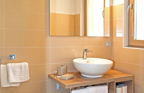 San Teodoro House | MOLAROTTO CAMERE CON ANGOLO COTTURA