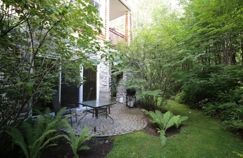 Tremblant-Les-Eaux Condo | Mont Tremblant-les-Eaux 213-1A Condo hot tub open walk to ski slopes & golf n