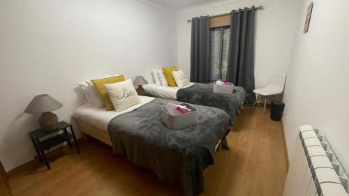 Palhais House | Montijo Lux & Design Room with living room and kitchen