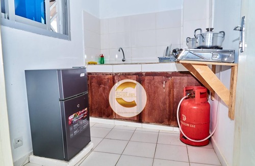 Yamoussoukro Apartment | MONTPARNASSE STUDIO 5 MIN FROM HISTORIC MONUMENTS AND TOURIST SITES.