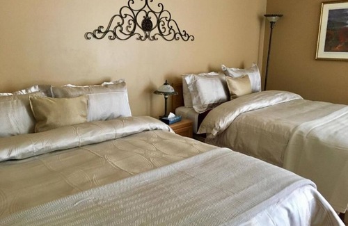 Baie-St-Paul Hotel | Motel Des Cascades: Whirlpool Superior Room