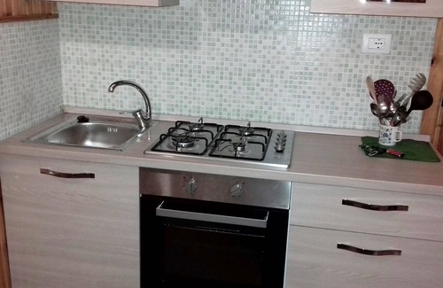 Campo di Giove Cottage | Mountain house covered in wood with fireplace 5 beds