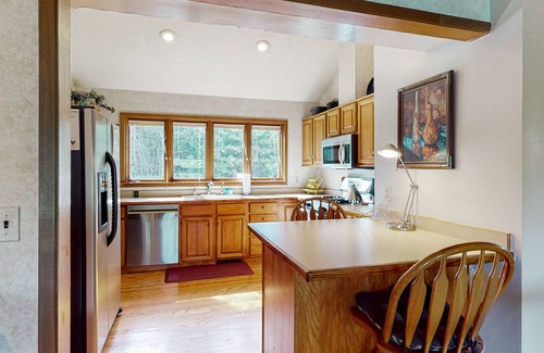 Kalispell House | Mountain- & lake-view retreat with private sauna, media room, deck & large yard