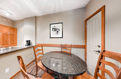 Village North Condo | Mountain view condo with hot tubs, outdoor pool & gym - walk to lifts