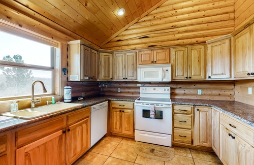Rainbow Valley Cabin | Mountain-view escape with private hot tub, fireplace, washer/dryer, and deck