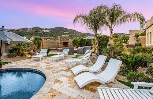 Anthem House | Mountain-view stay with sprawling outdoor space, pool, hot tub, & putting green