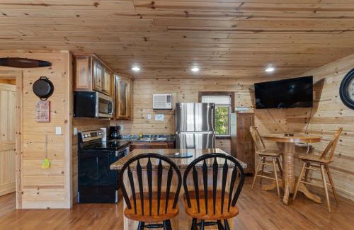 Bryant House | Mr Hills Mercantile Cabin with a hot tub