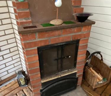 Lockna House | Mysig stuga med kamin och gratis båt
