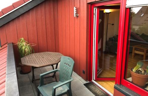 Huenfeld Apartment | Natürlicher Holzkomfort im hessischen Kegelspiel