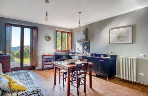 Fratticiola Selvatica Apartment | Nature's Haven Olivi Apartment in Renovated Farmhouse with Pool