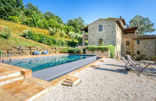 Fratticiola Selvatica Apartment | Nature's Haven Olivi Apartment in Renovated Farmhouse with Pool