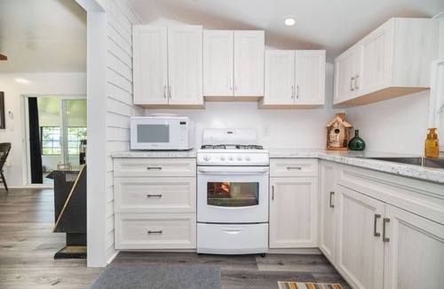 Whitewater Region Cottage | Nature Lover’s Dream – Riverfront Stay with Expansive Private Yard & Hot Tub