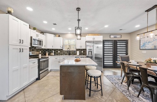 Nancy House | Near lake/boat ramp, hot-tub, fire-pit, king suite