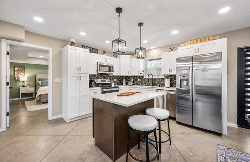 Nancy House | Near lake/boat ramp, hot-tub, fire-pit, king suite