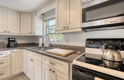 Southgate House | Near Siesta Key Beach, this Boho chic Sarasota pool home will feel like an oasis