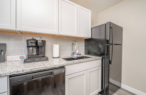 Wichita Apartment | Nearby Downtown! Stacked W&D + Pullout Sofa