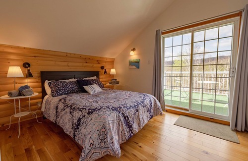 Saint Donat Ski Chalet | Nestled amidst the breathtaking beauty of a mountainous landscape.