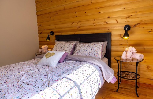 Saint Donat Ski Chalet | Nestled amidst the breathtaking beauty of a mountainous landscape.