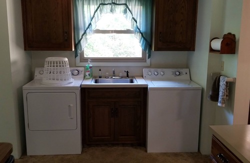Hillsboro House | Nestled near woods and creek, this large home is near state parks and colleges.