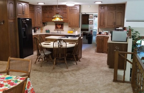 Hillsboro House | Nestled near woods and creek, this large home is near state parks and colleges.