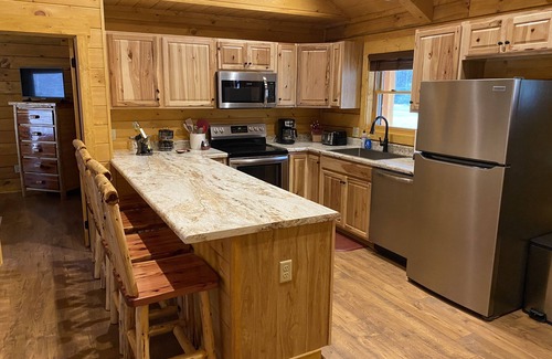 Ferguson Cabin | New 2/2 Log Cabin, Rushing Trout Stream, Hot Tub, Fireplace, 8 Acres, WiFi