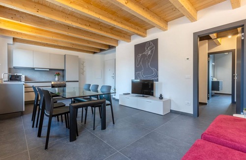Ferrara Apartment | New and spacious apartment of about 145 sqm, capable of accommodating up to 11 people, located on the second floor of a modern building without a lift.The property is located in a residential area of ​Ferrara, a few minutes walk from the city center