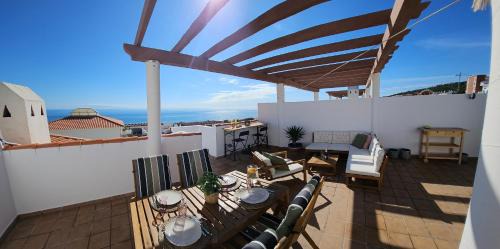 Puerto de la Duquesa Apartment | New Beachfront Apartment with Private Rooftop Terrace