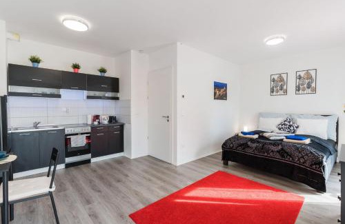 Csarnok negyed Apartment | New Blue Danube Apartment with Balcony and Parking