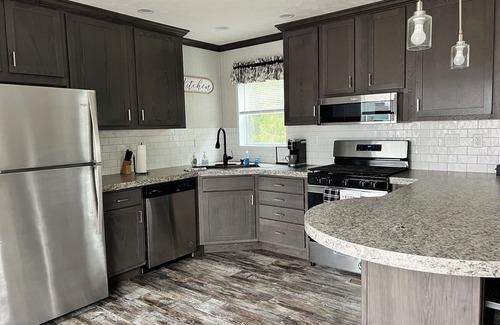 Menonaqua Beach Resort | New Cedar Walls Resort nestled between Harbor Springs & Petoskey.