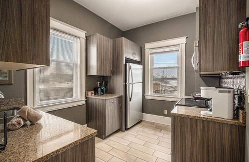 Central Business District Apartment | NEW Charming 2nd Floor Victorian Flat in Downtown Kalamazoo