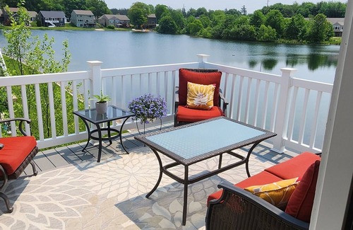 Crockery Township Condo | New condo on large swimming pond with double kayak