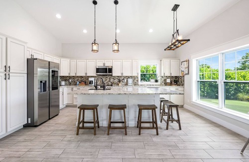 Jensen Beach House | New Construction Lakefront Home with Mini Golf Course, Heated Saltwater Pool!