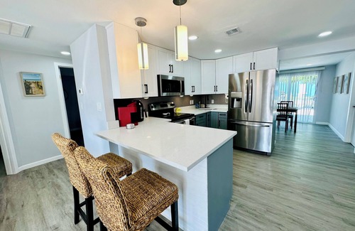 Hudson Beach Estates House | NEW! Facing Canal w/Grill, Outdoor Hangout Area & Cornhole