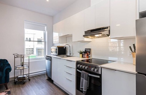 Plateau Mont Royal Apartment | New Flat Located closed on St-Denis Street by Denstays