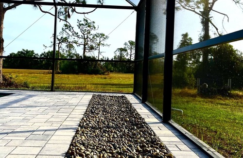 Jacarandas House | New heated pool/spa overlooking natural florida preserve.