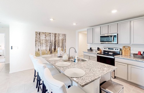 Spring Hill House | New home with large yard, covered patio, grill, central AC, & W/D