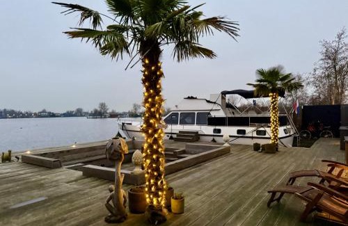 Baambrugse Zuwe Boat Rental | NEW - LITTLE IBIZA, on a lake near Amsterdam, with HOT TUB!